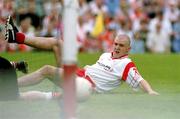 20 May 2001; Owen Mulligan of Tyrone watches as his shot enter the net for a goal during the Bank of Ireland Ulster Senior Football Championship Quarter-Final match between Tyrone and Armagh at St Tiernach's Park in Clones, Monaghan. Photo by David Maher/Sportsfile