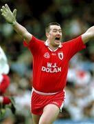 20 May 2001; Finbar McConnell of Tyrone celebrates victory against Armagh during the Bank of Ireland Ulster Senior Football Championship Quarter-Final match between Tyrone and Armagh at St Tiernach's Park in Clones, Monaghan. Photo by David Maher/Sportsfile