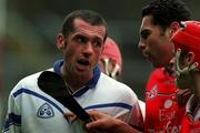 8 April 2001; Peter Queally of Waterford has words with Sean Og O hAilpin of Cork during the Allianz GAA National Hurling League Division 1B Round 4 match between Cork and Waterford at Páirc Uí Chaoimh in Cork. Photo by David Maher/Sportsfile