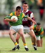 20 May 2001; Seamus Maguire of Leitrim in action against Declan Meehan of Galway during the Bank of Ireland Connacht Senior Football Championship Quarter-Final match between Galway and Leitrim at Tuam Stadium in Tuam, Galway. Photo by Brendan Moran/Sportsfile