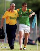 20 May 2001; Shane Canning of Leitrim leaves the field with an ankle injury during the Bank of Ireland Connacht Senior Football Championship Quarter-Final match between Galway and Leitrim at Tuam Stadium in Tuam, Galway. Photo by Brendan Moran/Sportsfile