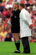 20 May 2001; Referee John Bannon has a word with one of his umpires during the Bank of Ireland Ulster Senior Football Championship Quarter-Final match between Tyrone and Armagh at St Tiernach's Park in Clones, Monaghan. Photo by David Maher/Sportsfile
