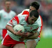 20 May 2001; Stephen O'Neill of Tyrone is tackled by Kieran McGeeney of Armagh during the Bank of Ireland Ulster Senior Football Championship Quarter-Final match between Tyrone and Armagh at St Tiernach's Park in Clones, Monaghan. Photo by Damien Eagers/Sportsfile