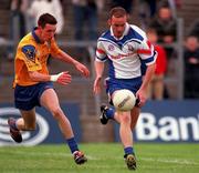 19 May 2001; Peter Loughran of New York in action against John Whyte of Roscommon during the Bank of Ireland All-Ireland Connacht Senior Football Championship Quarter-Final match between Roscommon and New York at Dr Hyde Park in Roscommon. Photo by Aoife Rice/Sportsfile