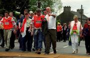 20 May 2001; Armagh fans walk through disinfectant mats on their way to the Bank of Ireland Ulster Senior Football Championship Quarter-Final match between Tyrone and Armagh at St Tiernach's Park in Clones, Monaghan. Photo by David Maher/Sportsfile