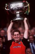 15 September 1991; Down Captain Paddy O'Rourke lifts the Sam Maguire cup following the All-Ireland Senior Football Championship Final between Down and Meath at Croke Park in Dublin. Photo by Ray McManus/Sportsfile