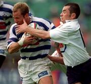 26 May 2001; Ryan Constable of Dungannon is tackled by Derek Dillon of Cork Constitution during the AIB All-Ireland League Final match between Dungannon and Cork Constitution at Lansdowne Road in Dublin. Photo by Brendan Moran/Sportsfile
