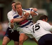 26 May 2001; Ryan Constable of Dungannon is tackled by Brian Walsh, 15, and Brian O'Meara of Cork Constitution during the AIB All-Ireland League Final match between Dungannon and Cork Constitution at Lansdowne Road in Dublin. Photo by Matt Browne/Sportsfile
