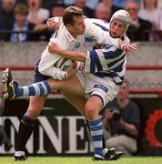 26 May 2001; Brian Walsh of Cork Constitution is tackled by Michael Haslett of Dungannon during the AIB All-Ireland League Final match between Dungannon and Cork Constitution at Lansdowne Road in Dublin. Photo by Brendan Moran/Sportsfile