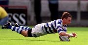 26 May 2001; Tyrone Howe of Dungannon dives to scores his side's last try during the AIB All-Ireland League Final match between Dungannon and Cork Constitution at Lansdowne Road in Dublin. Photo by Brendan Moran/Sportsfile