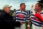 26 May 2001; Ken Maginnis of Dungannon celebrates with Justin Fitzpatrick and Ryan Constable following the AIB All-Ireland League Final match between Dungannon and Cork Constitution at Lansdowne Road in Dublin. Photo by Brendan Moran/Sportsfile