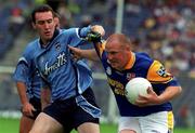 27 May 2001; Niall Sheridan of Longford is tackled by Paddy Christie of Dublin during the Bank of Ireland Leinster Senior Football Championship Quarter-Final match between Dublin and Longford at Croke Park in Dublin. Photo by Pat Murphy/Sportsfile