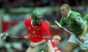 27 May 2001; Jerry O'Connor of Cork is tackled by James Moran of Limerick during the Guinness Munster Senior Hurling Championship Quarter-Final match between Cork and Limerick at Páirc Uí Chaoimh in Cork. Photo by Ray McManus/Sportsfile
