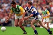 27 May 2001; Sean Grennan of Offaly is tackled by Brian McDonald of Laois during the Bank of Ireland Leinster Senior Football Championship Quarter-Final match between Offaly and Laois at Croke Park in Dublin. Photo by Damien Eagers/Sportsfile