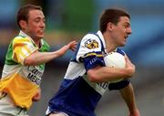 27 May 2001; Ian Fitzgerald of Laois in action against Barry Mooney of Offaly during the Bank of Ireland Leinster Senior Football Championship Quarter-Final match between Offaly and Laois at Croke Park in Dublin. Photo by Brendan Moran/Sportsfile