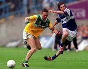 27 May 2001; Ger Rafferty of Offaly in action against Colm Parkinson of Laois during the Bank of Ireland Leinster Senior Football Championship Quarter-Final match between Offaly and Laois at Croke Park in Dublin. Photo by Damien Eagers/Sportsfile