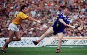 4 July 1993; James O'Connor of Clare in action against Raymie Ryan of Tipperary during the Munster Senior Hurling Championship Final match between Clare and Tipperary at the Gaelic Grounds in Limerick. Photo by Ray McManus/Sportsfile