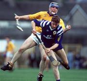4 July 1993; John Leahy of Tipperary in action against John Chaplin of Clare during the Munster Senior Hurling Championship Final match between Clare and Tipperary at the Gaelic Grounds in Limerick. Photo by Ray McManus/Sportsfile