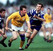 4 July 1993; Pat Fox of Tipperary gets away from Anthony Daly of Clare during the Munster Senior Hurling Championship Final match between Clare and Tipperary at the Gaelic Grounds in Limerick. Photo by Ray McManus/Sportsfile