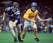 4 July 1993; Jim McInerney of Clare, in action against Paul Delaney of Tipperary during the Munster Senior Hurling Championship Final match between Clare and Tipperary at the Gaelic Grounds in Limerick. Photo by Ray McManus/Sportsfile