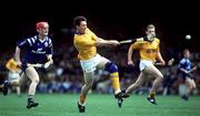 4 July 1993; Pat Fox of Tipperary in action against Brian Lohan of Clare during the Munster Senior Hurling Championship Final match between Clare and Tipperary at the Gaelic Grounds in Limerick. Photo by Ray McManus/Sportsfile