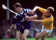 4 July 1993; John Moroney of Clare in action against Anthony Crosse of Tipperary during the Munster Senior Hurling Championship Final match between Clare and Tipperary at the Gaelic Grounds in Limerick. Photo by Ray McManus/Sportsfile