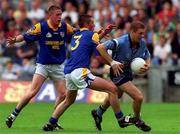 27 May 2001; Dessie Farrell of Dublin in action against Donal Ledwith, 3, and team-mate David Blessington of Longford during the Bank of Ireland Leinster Senior Football Championship Quarter-Final match between Dublin and Longford at Croke Park in Dublin. Photo by Damien Eagers/Sportsfile