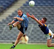27 May 2001; Vinny Murphy of Dublin in action against Donal Ledwith of Longford during the Bank of Ireland Leinster Senior Football Championship Quarter-Final match between Dublin and Longford at Croke Park in Dublin. Photo by Brendan Moran/Sportsfile