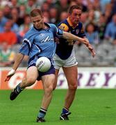 27 May 2001; Dessie Farrell of Dublin is tackled by Ian Browne of Longford during the Bank of Ireland Leinster Senior Football Championship Quarter-Final match between Dublin and Longford at Croke Park in Dublin. Photo by Brendan Moran/Sportsfile