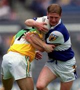 27 May 2001; Brian McDonald of Laois is tackled by Karl Slattery of Offaly during the Bank of Ireland Leinster Senior Football Championship Quarter-Final match between Offaly and Laois at Croke Park in Dublin. Photo by Brendan Moran/Sportsfile