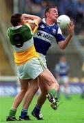27 May 2001; John Kealy of Laois is tackled by Ciaran McManus of Offaly during the Bank of Ireland Leinster Senior Football Championship Quarter-Final match between Offaly and Laois at Croke Park in Dublin. Photo by Damien Eagers/Sportsfile