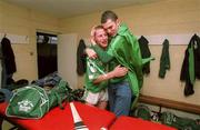 27 May 2001; Ciaran Carey of Limerick is embraced by supporter Eoghan Murphy, from Patrickswell, in the dressing room following the Guinness Munster Senior Hurling Championship Quarter-Final match between Cork and Limerick at Páirc Uí Chaoimh in Cork. Photo by Ray McManus/Sportsfile