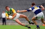 27 May 2001; Ciaran McManus of Offaly is tackled by John Kealy of Laois during the Bank of Ireland Leinster Senior Football Championship Quarter-Final match between Offaly and Laois at Croke Park in Dublin. Photo by Brendan Moran/Sportsfile