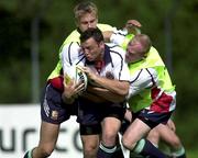 28 May 2001; Rob Henderson of Ireland is tackled by Simon Taylor of Scotland and Neil Jenkens of Wales during a British and Irish Lions squad training session at the Army Rugby Playing Fields in Aldershot, England. Photo by Matt Browne/Sportsfile