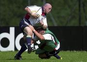 28 May 2001; Keith Wood of Ireland, is tackled by Robbie McBride of Wales during a British and Irish Lions squad training session at the Army Rugby Playing Fields in Aldershot, England. Photo by Matt Browne/Sportsfile