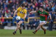 27 March 2016; Cathal Cregg, Roscommon, in action against Brendan Harrison, Mayo. Allianz Football League Division 1 Round 6, Roscommon v Mayo. Dr Hyde Park, Roscommon.  Picture credit: Brendan Moran / SPORTSFILE