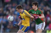 27 March 2016; Enda Smith, Roscommon, in action against Alan Freeman, Mayo. Allianz Football League Division 1 Round 6, Roscommon v Mayo. Dr Hyde Park, Roscommon. Picture credit: Brendan Moran / SPORTSFILE