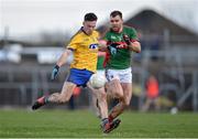 27 March 2016; Neil Collins, Roscommon, in action against Seamus O'Shea, Mayo. Allianz Football League Division 1 Round 6, Roscommon v Mayo. Dr Hyde Park, Roscommon.   Picture credit: Brendan Moran / SPORTSFILE