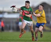 27 March 2016; Evan Regan, Mayo, in action against Sean McDermott, Roscommon. Allianz Football League Division 1 Round 6, Roscommon v Mayo. Dr Hyde Park, Roscommon.  Picture credit: Brendan Moran / SPORTSFILE