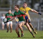 27 March 2016; Tom Parsons, Mayo, in action against Ciaran Murtagh, Roscommon. Allianz Football League Division 1 Round 6, Roscommon v Mayo. Dr Hyde Park, Roscommon.  Picture credit: Brendan Moran / SPORTSFILE