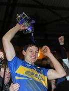 31 March 2010; Tipperary captain Ciaran McDonald lifts the trophy following his side’s victory over Kerry. Cadbury Munster GAA Football Under 21 Championship Final, Kerry v Tipperary, Austin Stack Park, Tralee, Co. Kerry. Picture credit: Stephen McCarthy / SPORTSFILE