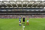 17 March 2010; Referee Derek Fahy shows the result of the coin toss to St Gall's captain Colin Brady, left, and Kilmurry Ibrickane captain Enda Coughlan before the game. AIB GAA Football All-Ireland Senior Club Championship Final, Kilmurry Ibrickane v St Gall's, Croke Park, Dublin. Picture credit: Brendan Moran / SPORTSFILE