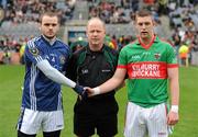 17 March 2010; Team captains Colin Brady, St Gall's, left, shakes hands with Enda Coughlan, Kilmurry Ibrickane, in the company of referee Derek Fahy. AIB GAA Football All-Ireland Senior Club Championship Final, Kilmurry Ibrickane v St Gall's, Croke Park, Dublin. Picture credit: Brendan Moran / SPORTSFILE
