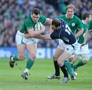 20 March 2010; Cian Healy, Ireland, is tackled by Graeme Morrison, Scotland. RBS Six Nations Rugby Championship, Ireland v Scotland, Croke Park, Dublin. Picture credit: Brendan Moran / SPORTSFILE