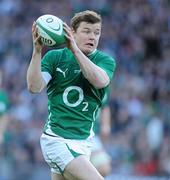 20 March 2010;  Brian O'Driscoll, Ireland, catches a pass on the way to scoring his side's first try. RBS Six Nations Rugby Championship, Ireland v Scotland, Croke Park, Dublin. Picture credit: Brendan Moran / SPORTSFILE