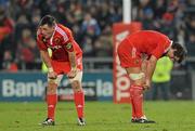 2 April 2010; Dejected Munster players James Coughlan, left, and Donncha O'Callaghan at the final whistle. Celtic League, Munster v Leinster, Thomond Park, Limerick. Picture credit: Diarmuid Greene / SPORTSFILE