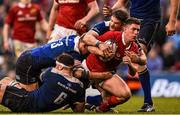 2 April 2016; Ian Keatley, Munster, is tackled by Leinster players, from left, Rhys Ruddock, Garry Ringrose and Jamie Heaslip. Guinness PRO12 Round 19, Leinster v Munster. Aviva Stadium, Lansdowne Road, Dublin.  Picture credit: Ramsey Cardy / SPORTSFILE