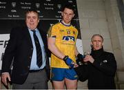 2 April 2016; Diarmuid Murtagh, Roscommon, receives his man of the match award after the game from Mick Rock, President Connacht GAA, left, and Alan Kelly, Community Liason officer, EirGrid. EirGrid Connacht GAA Football U21 Championship Final. Markievicz Park, Sligo.  Picture credit: Oliver McVeigh / SPORTSFILE