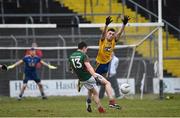 2 April 2016; Michael Plunkett, Mayo, kicks the winning point in injury time despite the attempted block of Brian Stack, Roscommon. EirGrid Connacht GAA Football U21 Championship Final. Markievicz Park, Sligo. Picture credit: Oliver McVeigh / SPORTSFILE