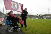 3 April 2016; Galway supporter John Tobin, from Williamstown, Co. Galway, with his caretaker Clive Guthrie on the pitch ahead of the match. Allianz Football League, Division 2, Round 7, Cavan v Galway. Kingspan Breffni Park, Cavan. Picture credit: Cody Glenn / SPORTSFILE